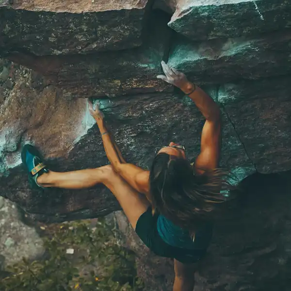 Rock climber tackling granite crag